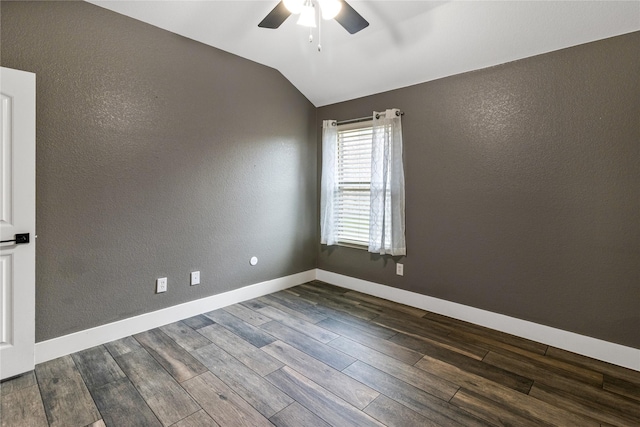 990 Lancashire Ln, Prosper, TX 75078 - spare room featuring ceiling fan, dark wood-style floors, vaulted ceiling, a textured wall, and baseboards