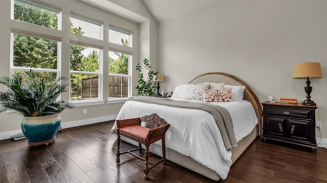 8162 Edgefield Ct, Frisco, TX 75035 - bedroom featuring multiple windows and wood finished floors