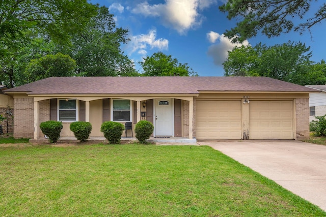 1001 N Ector Dr, Euless, TX 76039 - single story home with brick siding, an attached garage, concrete driveway, and a front lawn