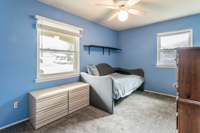 1001 N Ector Dr, Euless, TX 76039 - carpeted bedroom featuring baseboards and a ceiling fan