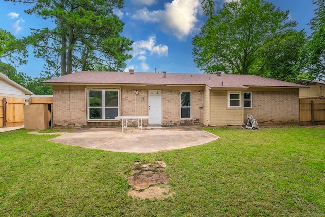 1001 N Ector Dr, Euless, TX 76039 - back of property featuring brick siding and a patio