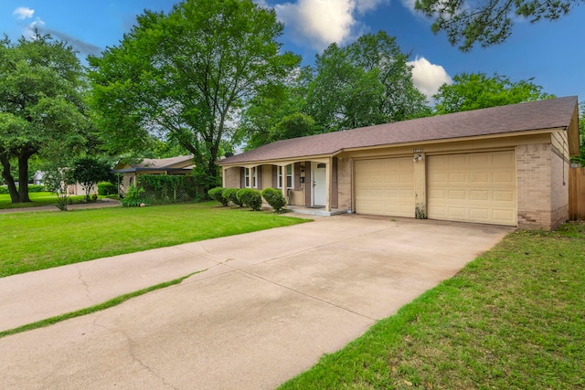 1001 N Ector Dr, Euless, TX 76039 - single story home featuring brick siding, a garage, concrete driveway, a front lawn, and a porch