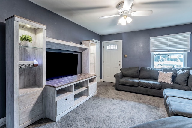 1001 N Ector Dr, Euless, TX 76039 - living area featuring a ceiling fan, carpet flooring, and plenty of natural light