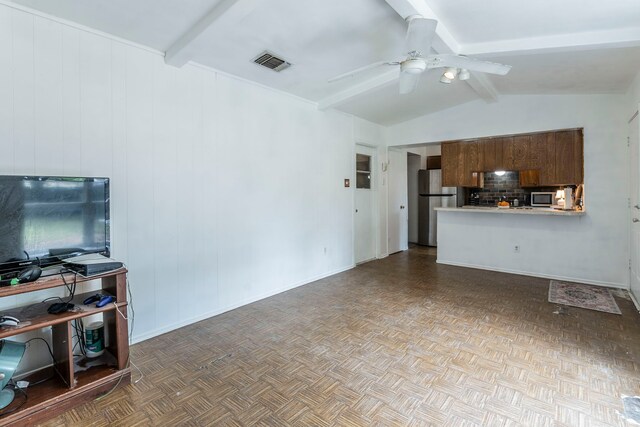 1001 N Ector Dr, Euless, TX 76039 - unfurnished living room featuring ceiling fan and baseboards