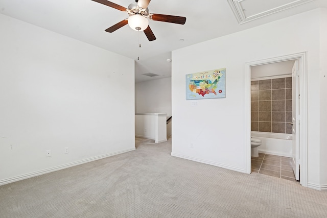 4682 Rhett Ln Unit A, Carrollton, TX 75010 - unfurnished bedroom featuring attic access, baseboards, carpet, ensuite bath, and tile patterned flooring