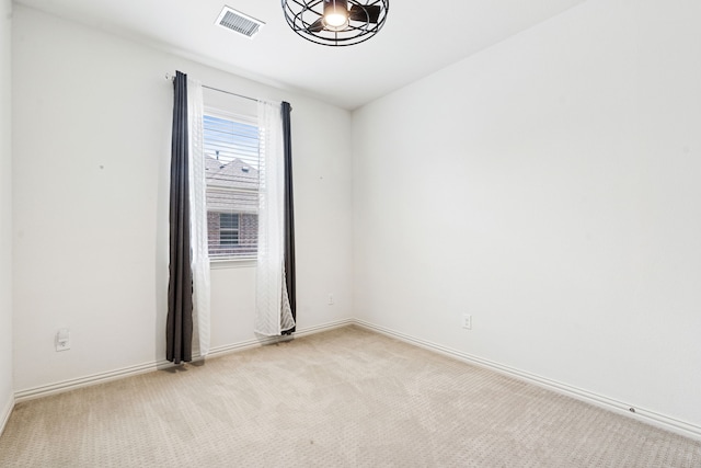 4682 Rhett Ln Unit A, Carrollton, TX 75010 - spare room featuring light carpet and baseboards