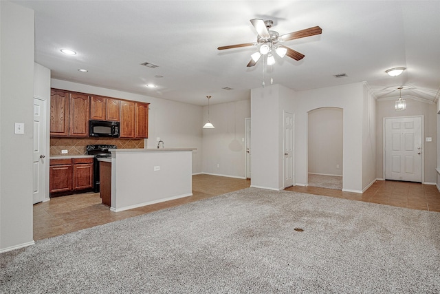 2409 Ravenwood Ct, Mansfield, TX 76063 - kitchen with black appliances, ceiling fan, light carpet, arched walkways, and recessed lighting