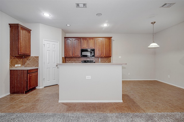 2409 Ravenwood Ct, Mansfield, TX 76063 - kitchen featuring black microwave, light tile patterned floors, decorative backsplash, and recessed lighting