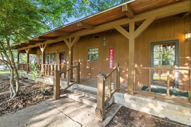 891 Lazy Acres Cir, Pottsboro, TX 75076 - view of exterior entry featuring covered porch