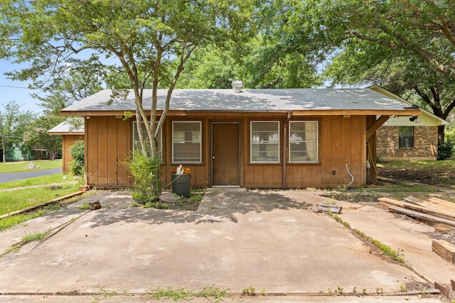 891 Lazy Acres Cir, Pottsboro, TX 75076 - view of front of property featuring board and batten siding and a patio area