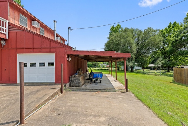 891 Lazy Acres Cir, Pottsboro, TX 75076 - garage featuring a wall mounted AC and driveway