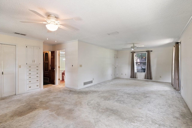 891 Lazy Acres Cir, Pottsboro, TX 75076 - unfurnished room featuring a ceiling fan, a textured ceiling, crown molding, and light carpet