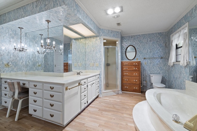 891 Lazy Acres Cir, Pottsboro, TX 75076 - bathroom with crown molding, vanity, wood finished floors, a shower stall, and a textured ceiling