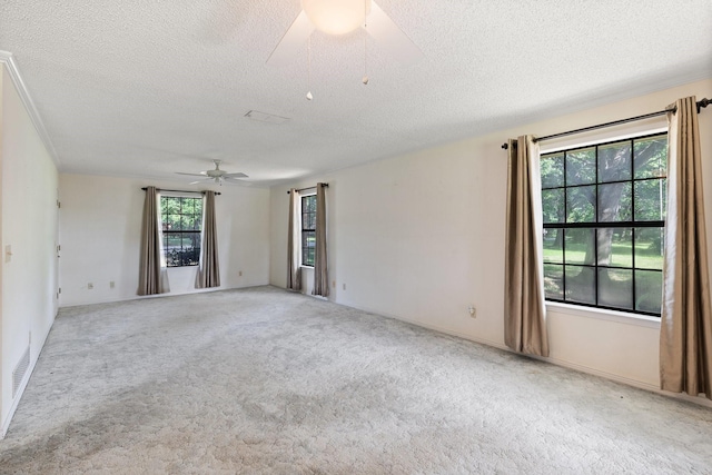 891 Lazy Acres Cir, Pottsboro, TX 75076 - empty room featuring a ceiling fan, a textured ceiling, and carpet floors