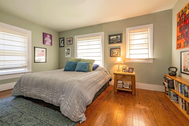 1909 Alston Ave, Fort Worth, TX 76110 - bedroom featuring wood-type flooring and baseboards
