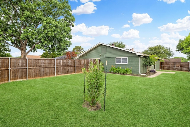 5044 Avery Ln, The Colony, TX 75056 - rear view of house with brick siding and a chimney