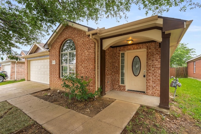 648 Tabasco Trl, Arlington, TX 76002 - view of front facade with driveway, a garage, and brick siding