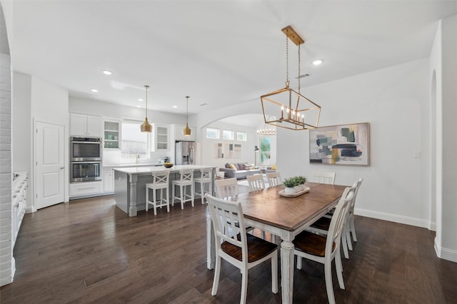 506 Prairie Run, Aledo, TX 76008 - dining space with plenty of natural light, baseboards, dark wood finished floors, recessed lighting, and a chandelier