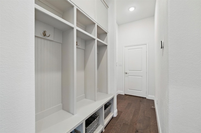 506 Prairie Run, Aledo, TX 76008 - mudroom with dark wood finished floors and a textured wall