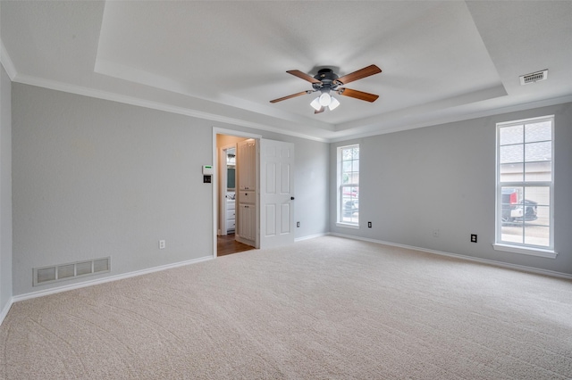 4704 N Meadow Ridge Cir, Mckinney, TX 75072 - unfurnished bedroom with a tray ceiling, carpet flooring, baseboards, a ceiling fan, and ornamental molding