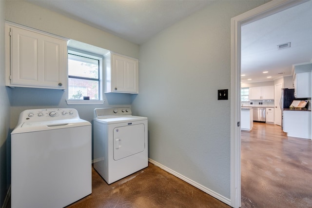 4704 N Meadow Ridge Cir, Mckinney, TX 75072 - washroom with washer and dryer, cabinet space, healthy amount of natural light, and baseboards
