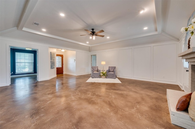 4704 N Meadow Ridge Cir, Mckinney, TX 75072 - unfurnished room with a ceiling fan, concrete floors, a fireplace, a decorative wall, and lofted ceiling