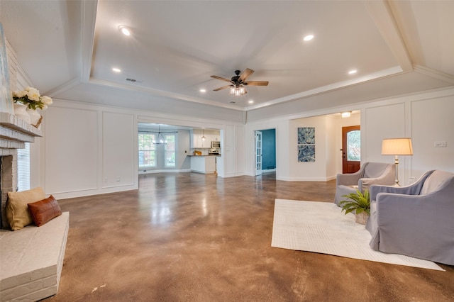 4704 N Meadow Ridge Cir, Mckinney, TX 75072 - living room with concrete flooring, a ceiling fan, a fireplace, a decorative wall, and recessed lighting