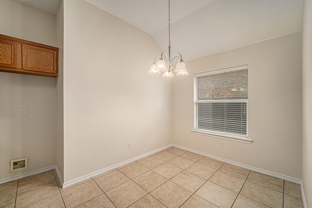 5516 La Bandera Trl, Benbrook, TX 76126 - unfurnished dining area featuring light tile patterned floors, a chandelier, baseboards, and lofted ceiling