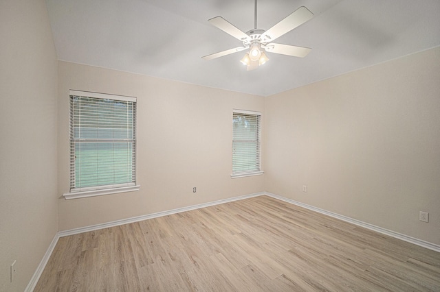 5516 La Bandera Trl, Benbrook, TX 76126 - unfurnished room with light wood finished floors, baseboards, ceiling fan, and plenty of natural light