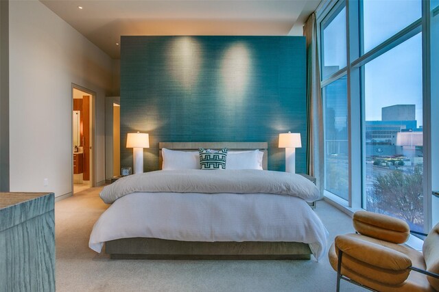 1918 N Olive St Unit 302, Dallas, TX 75201 - carpeted bedroom featuring multiple windows