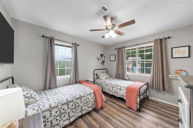 102 Creek Dr, Whitney, TX 76692 - bedroom featuring wood finished floors, baseboards, and a ceiling fan