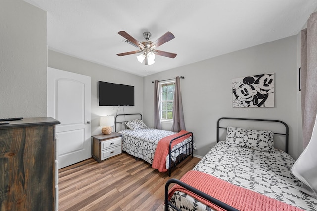 102 Creek Dr, Whitney, TX 76692 - bedroom featuring wood finished floors and a ceiling fan
