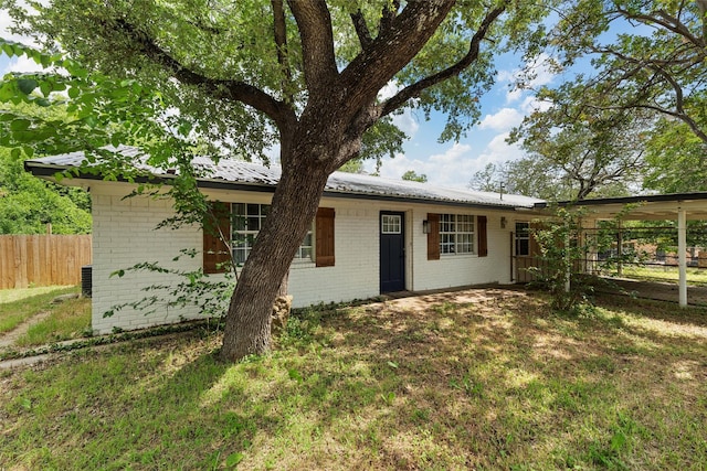 102 Creek Dr, Whitney, TX 76692 - ranch-style house with brick siding and metal roof