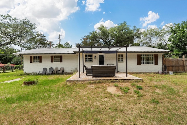 102 Creek Dr, Whitney, TX 76692 - back of property featuring brick siding, a deck, metal roof, and an outdoor hangout area