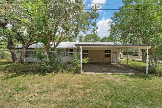 102 Creek Dr, Whitney, TX 76692 - view of front of property featuring an attached carport, board and batten siding, and metal roof