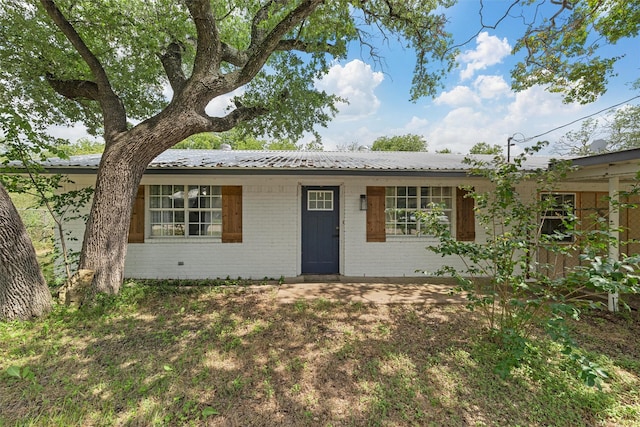 102 Creek Dr, Whitney, TX 76692 - ranch-style house featuring brick siding and metal roof