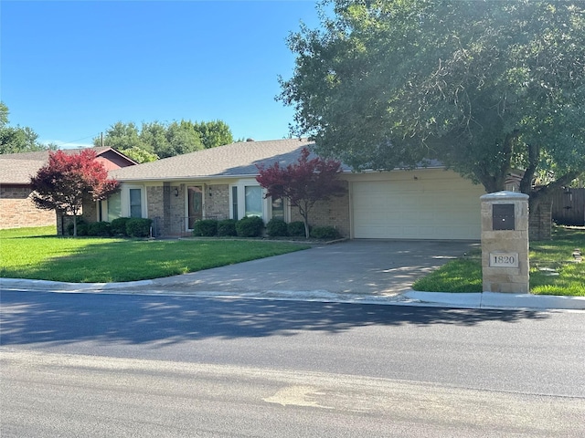 1820 High Ridge Rd, Benbrook, TX 76126 - view of front of house with driveway, a garage, and a front lawn