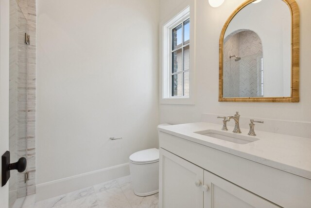 1801 Loving Ave, Dallas, TX 75214 - full bath with marble finish floors, toilet, vanity, a shower, and baseboards