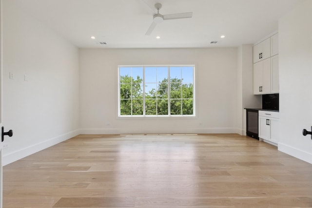 1801 Loving Ave, Dallas, TX 75214 - unfurnished living room featuring light wood-type flooring, baseboards, recessed lighting, and ceiling fan