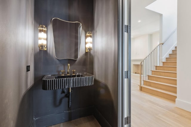 1801 Loving Ave, Dallas, TX 75214 - bathroom featuring wood finished floors, a sink, and recessed lighting