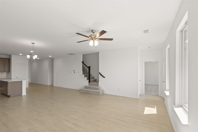 3121 Dixondale Dr, Fort Worth, TX 76108 - unfurnished living room with recessed lighting, light wood finished floors, baseboards, a ceiling fan, and stairway