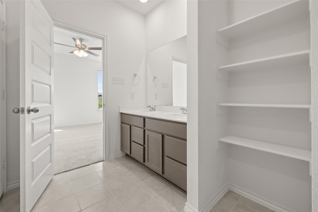 3121 Dixondale Dr, Fort Worth, TX 76108 - full bathroom with double vanity, a ceiling fan, tile patterned floors, and baseboards