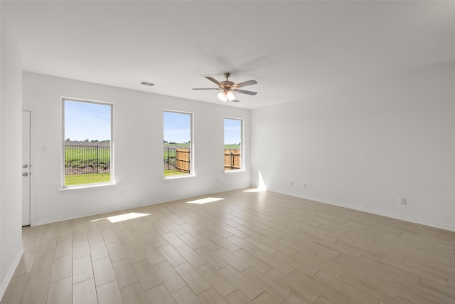 3121 Dixondale Dr, Fort Worth, TX 76108 - unfurnished room featuring ceiling fan, light wood finished floors, and baseboards