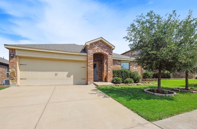 806 Opal Path, Princeton, TX 75407 - traditional-style house featuring brick siding, driveway, an attached garage, a front yard, and central AC