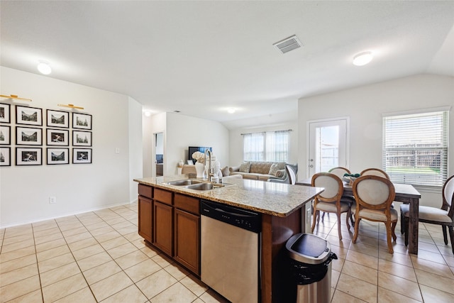 806 Opal Path, Princeton, TX 75407 - kitchen with dishwasher, a sink, light tile patterned floors, vaulted ceiling, and an island with sink