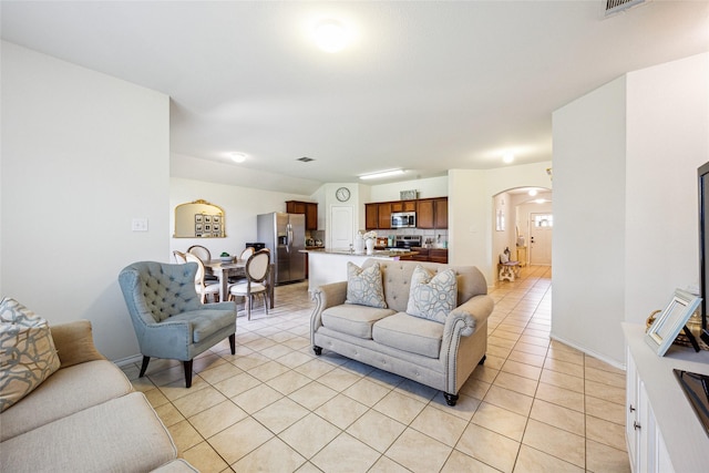 806 Opal Path, Princeton, TX 75407 - living area featuring arched walkways and light tile patterned floors