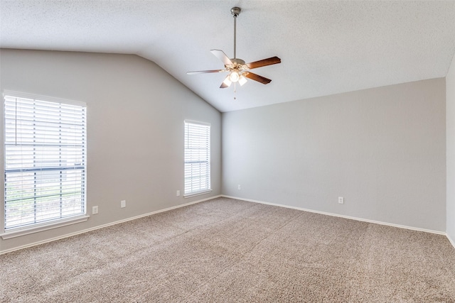 6704 Wesson Dr, Plano, TX 75023 - carpeted empty room featuring ceiling fan, vaulted ceiling, and baseboards