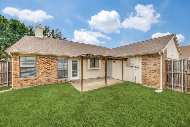 6704 Wesson Dr, Plano, TX 75023 - rear view of house with a chimney, a shingled roof, a patio area, and brick siding