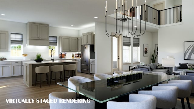 9434 Hedge St, Frisco, TX 75035 - dining area with light wood finished floors, recessed lighting, and a high ceiling