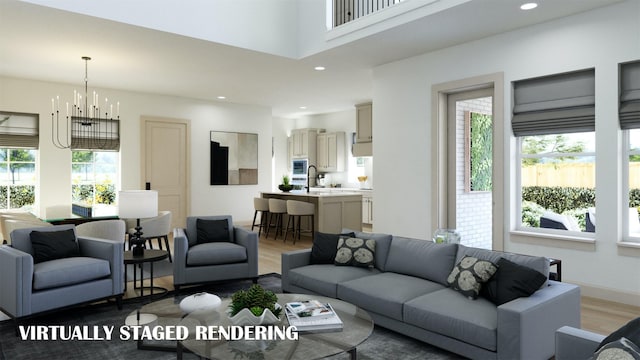 9434 Hedge St, Frisco, TX 75035 - living room featuring light wood-style floors and recessed lighting